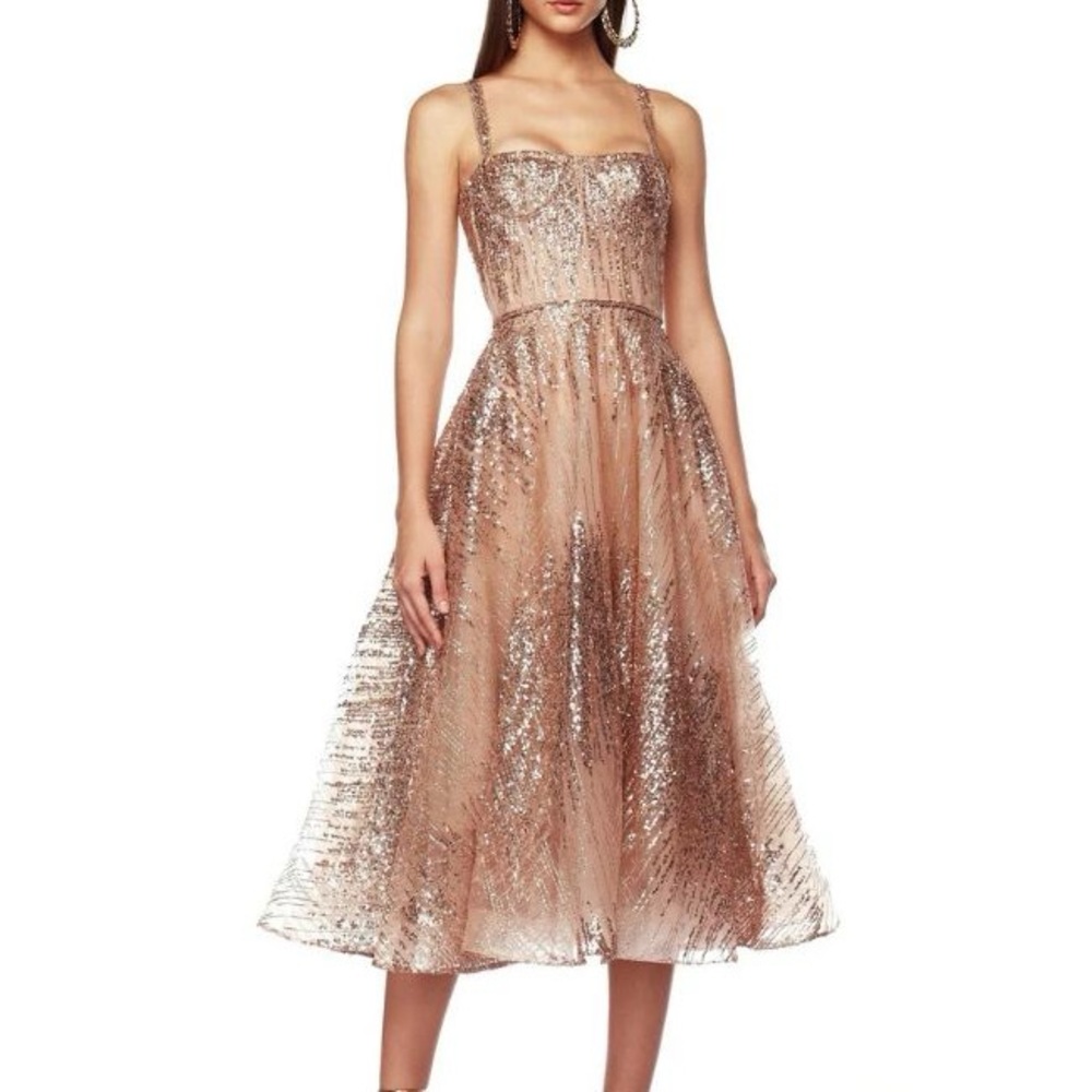 Bronx and banco . Mademoiselle  rose gold sequence mini dress 👗